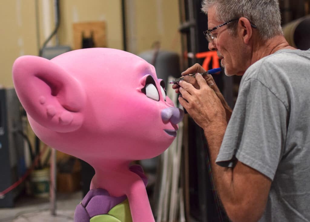 Trolls the Experience, airbrushing their eyes.